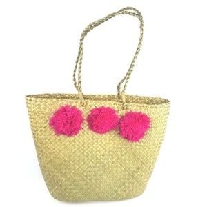 Herringbone Straw Tote Bag with Hot Pink Pom Poms